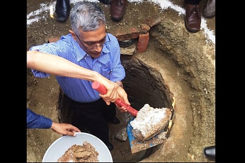 Leading by example: Swachh Bharat Mission secretary cleans toilet pit in Telangana village