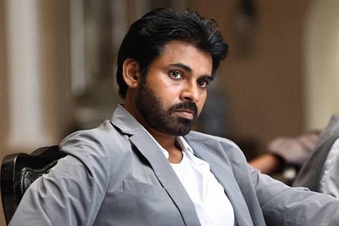 Pawan Kalyan is seen in a grey blazer in the image