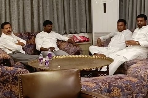 The four TRS MLAs inside the farmhouse