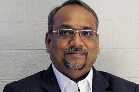 Pradeep Agarwal smiling looking at the camera