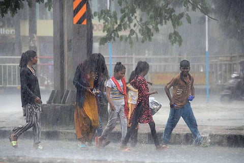 People stranded in rain