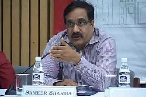 Sameer Sharma sitting on his desk