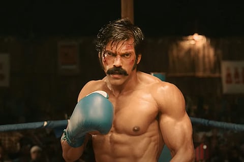 Arya seen as a boxer in the poster of Sarpatta Parambarai