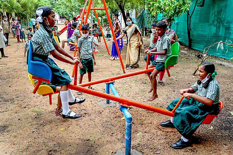 School kids playing in the ground