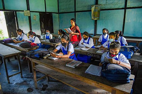 A group of students sitting in class