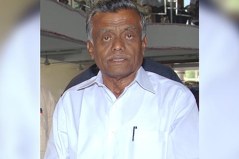 Sedapatti R Muthaiah in a white shirt