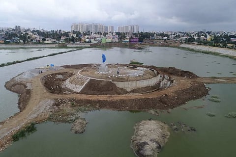 Shiva statue in Begur lake