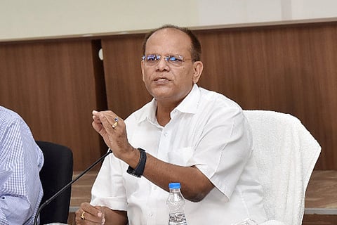 Telangana Chief Secretary Somesh Kumar with his right hand outstretched