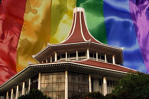 Supreme Court of Sri Lanka against the backdrop of rainbow colored flag