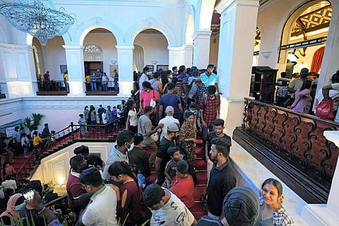 Sri Lankan protesters inside the President's official residence: India has said it stands by the people of Sri Lanka