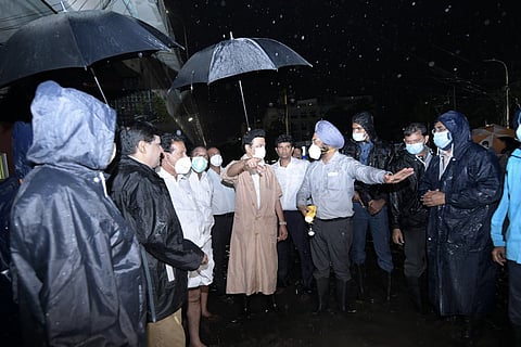 Tamil Nadu Chief Minister wearing a raincoat and taking stock of the situation in Chennai
