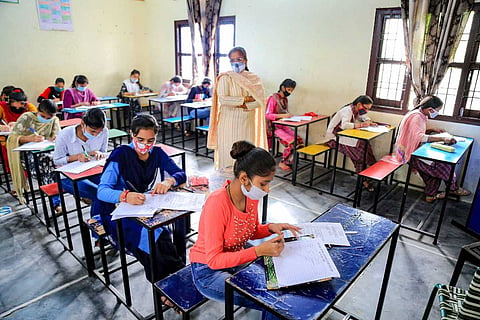 Representative image of students writing an exam: Andhra Class 10, Intermediate exam schedule released: Details here