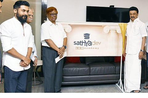 Actor Surya and retired Justice Chandru with CM MK Stalin