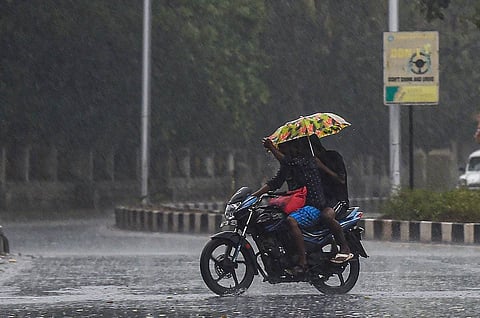 Rains bike Chennai road