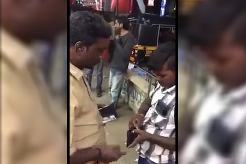 Kerala man caught on cam demanding Aadhaar from migrant labourer and slapping him