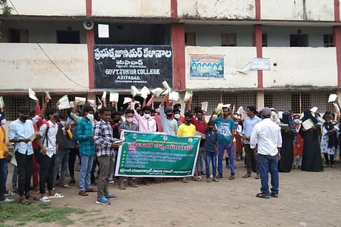 Students stage protest under the banner of Committee for Tribal University in Asifabad