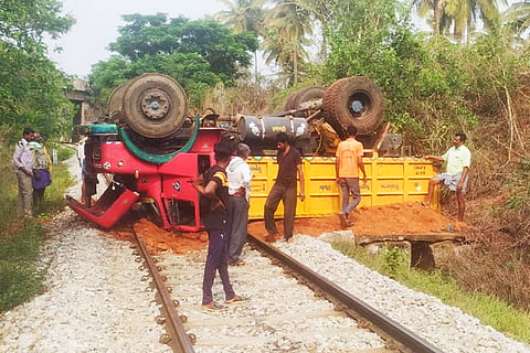 Truck toppled over on railway track