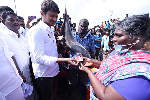 DMK leader Udhayanidhi Stalin with fishermen of Akkaraipettai