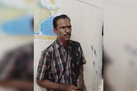 Vijay P Nair in black oil