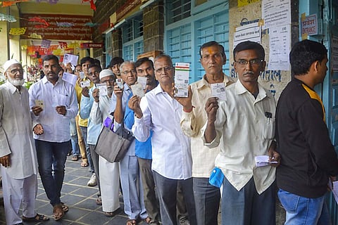 Voters in a queue