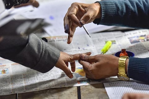 Finger getting inked after polling