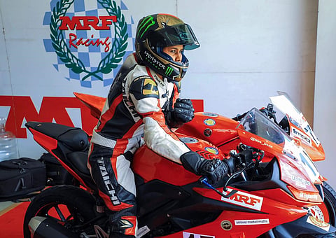 woman biker red mrf bike