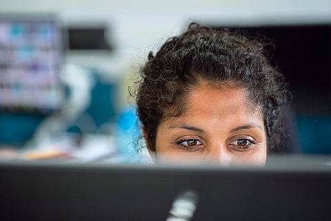 Woman in front of a computer