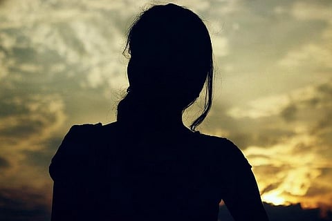 Representative image of woman in silhouette