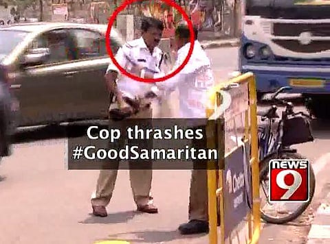 Watch cop rough up man who helped ambulance stuck in traffic