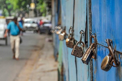Representative image of shutters being locked with locks