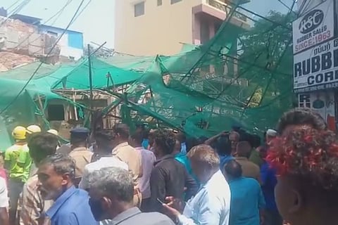 People near the collapsed building in Chennai