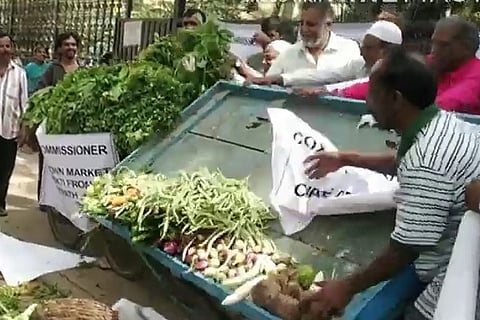 Bengaluru Cox Town vendors throw vegetables on street in protest against BBMP
