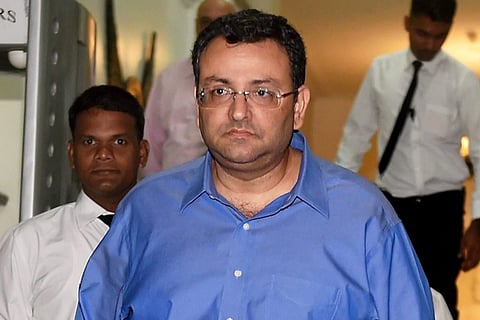 Cyrus Mistry in blue shirt