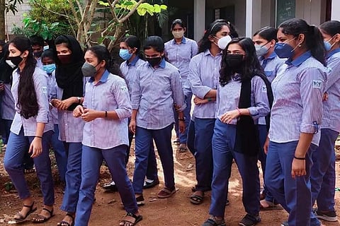 Kerala girl students wearing pants and shirt as school uniform in a school campus