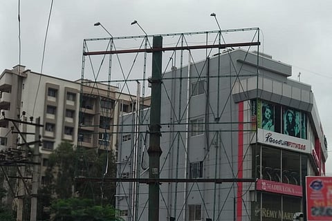Hoarding for which 25 trees were culled in Bengaluru pulled down for the second time