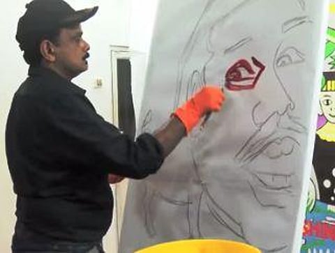 Chennai artist paints Rajapakse with pig's blood, earns ire of animal rights' groups