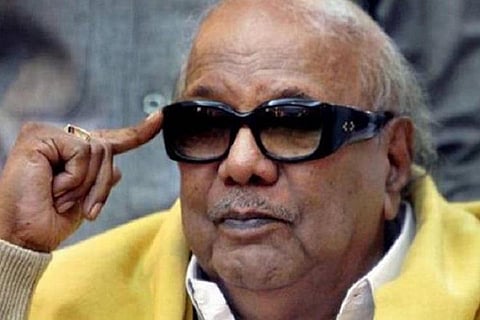 M Karunanidhi with his right index finger on his forehead