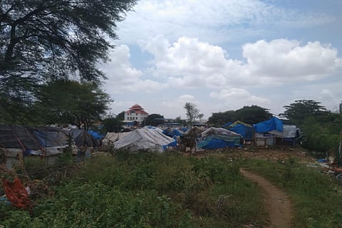 View of Karcharkanahalli slum with temple visible in the background