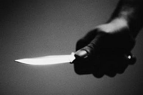 A man holding a knife