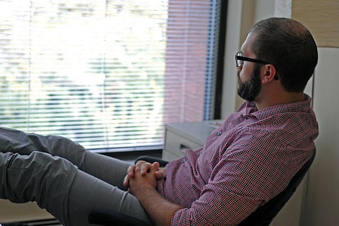 Man sitting in therapy