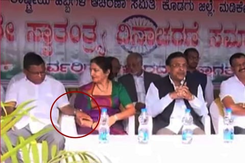Caught on cam: Karnataka Cong leader holds woman MLC's hand as she squirms in discomfort