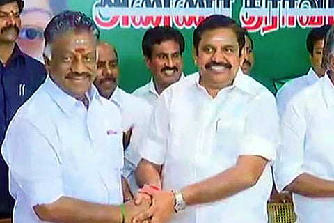 OPS shakes hands with EPS at last: Warring AIADMK factions merge