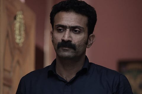 Image featuring Shine Tom Chacko wearing a black shirt.