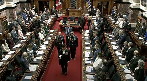 BC Lt. Gov. Wendy Cocchia shaking hands with MLAs following her first speech from the throne