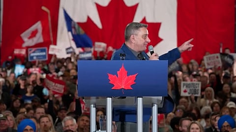 Arnie Stadnick speaking at Pierre Poilievre's rally near Edmonton
