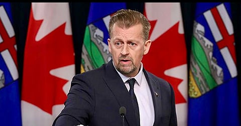 Minister Mike Ellis