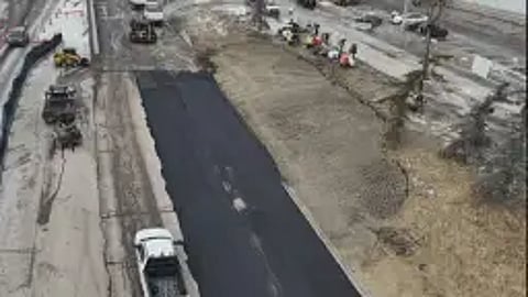 New pavement on 16 Ave, NW covers the Bearspaw water main break