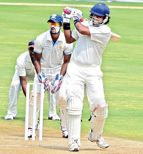 Tiwary helps east seize edge