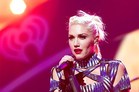 The file photo originally released by Clear Channel shows Gwen Stefani of No Doubt performing at the 2012 iHeartRadio Music Festival at the MGM Grand Garden Arena in Las Vegas, Nev. (AP Photo/Clear Channel, Andrew Swartz)
