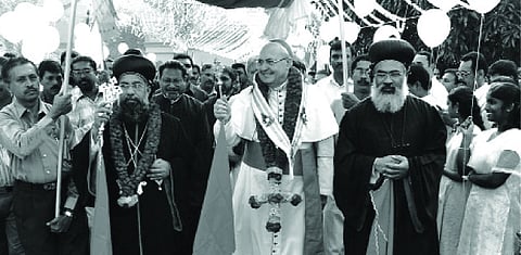 Catholicos Moran Mor Baselios Cleemis (left) ushers in Prefect of the Congregation of Oriental Churches Cardinal Leonardo Sandri